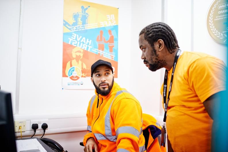 Employees working at computer